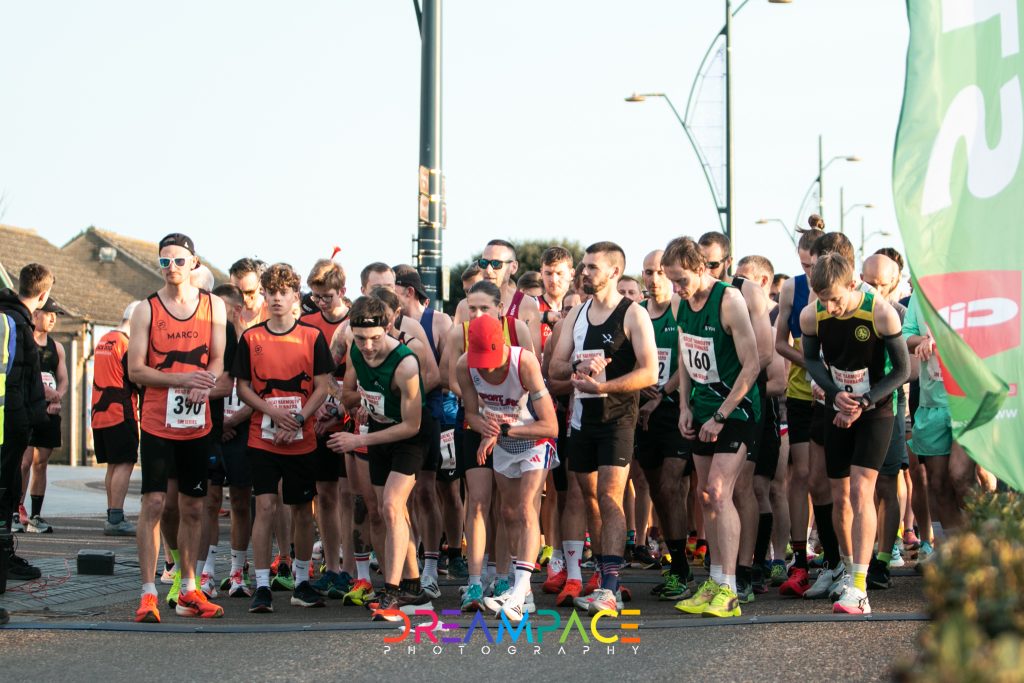 Sportlink GP Yarmouth 5M Runners line up at the start of race one of the Great Yarmouth Promenade 5M Series